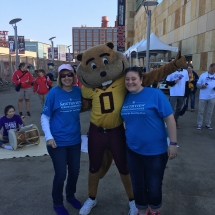 Our Team at 2017 Alzheimer's Walk-Oak Park Senior Living-taking a picture with the Gopher mascot