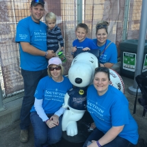 Our Team at 2017 Alzheimer's Walk-Oak Park Senior Living-family shot with Snoopy